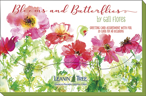 Close-up of 'Blooms and Butterflies' greeting card assortment box by Gail Flores, featuring vibrant pink and red watercolor flowers.