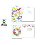 Two open greeting cards demonstrating dimensions (7"x5") and sustainability features. One shows colorful butterflies for "Happy Birthday," the other a floral wreath for "Happy Anniversary." Logos for Sustainably-Sourced Paper, Soy-Based Inks, and Made in USA are visible.