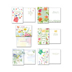 A grid of six open assorted greeting cards. Designs include "Sending Sunny Thoughts," "So Very Grateful," "Sending hugs & warm thoughts," "Happiness is a flower," and a card with a watering can design, all with floral themes.