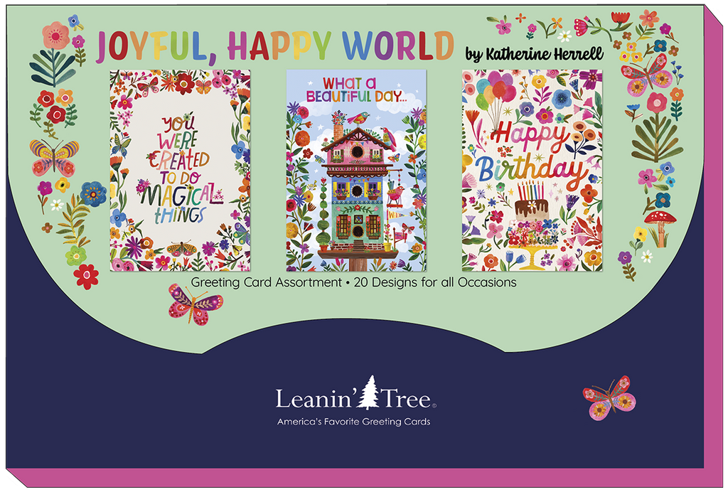 Packaging for the 'Joyful, Happy World' Leanin' Tree greeting card assortment by Katherine Hernell, showcasing three distinct card designs with floral and butterfly motifs, and the brand tagline 'America's Favorite Greeting Cards'.