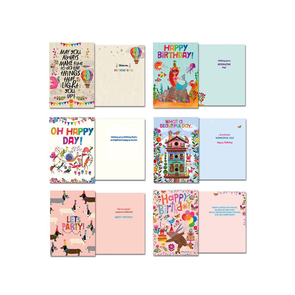 Six assorted Leanin' Tree greeting cards by Katherine Hernell, showing front and inside views. Designs include hot air balloon, dancing figures, and dachshunds, with messages like 'OH HAPPY DAY!' and 'LETS PARTY!'.