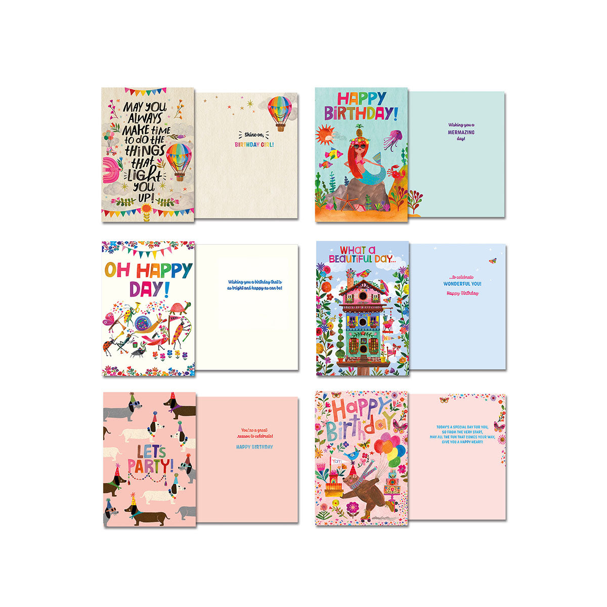 Six assorted Leanin' Tree greeting cards by Katherine Hernell, showing front and inside views. Designs include hot air balloon, dancing figures, and dachshunds, with messages like 'OH HAPPY DAY!' and 'LETS PARTY!'.