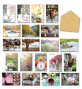 Comprehensive view of the Leanin' Tree 'Through the Seasons' greeting card assortment, featuring 20 unique photographic designs for various occasions like birthday, thank you, sympathy, and thinking of you, alongside a plain craft envelope, showcasing the diverse collection.