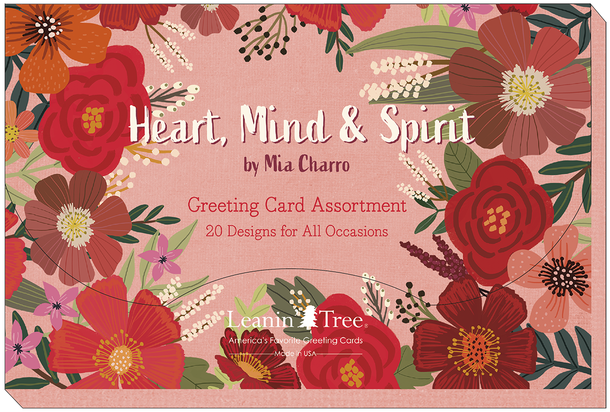 Close-up of the Heart, Mind & Spirit greeting card assortment box cover by Mia Charro, featuring a floral border and text '20 Designs for All Occasions' from Leanin' Tree, Made in USA.