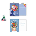 Two open greeting cards from the Mia Charro assortment, showing fronts and insides. One features 'You are beautiful and worthy' with a starry woman, the other 'have a positive mind' with a floral-haired woman. Details highlight 'Sustainably-Sourced Paper,' 'Soy-Based Inks,' and 'Made in USA'.