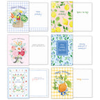 Arrangement of ten open greeting cards from the assortment, displaying both front designs and inside messages. Includes 'Lettuce Celebrate,' 'Happy Birthday' with lemons, floral 'Happy Birthday,' and 'Happy Birthday Blue-tiful' cards.