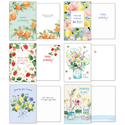 Group of 6 greeting cards showing front designs: oranges, "You're simply the Zest!", strawberries, bees, lemons, and wildflowers.