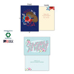 Two cowgirl-themed greeting cards, front and inside views. One card shows 'Made in the USA' with a cowboy hat and flowers, the other 'Cowgirls at Heart' with text 'Here's to our wild and wonderful friendship'. Sustainably-sourced paper and soy-based inks noted.