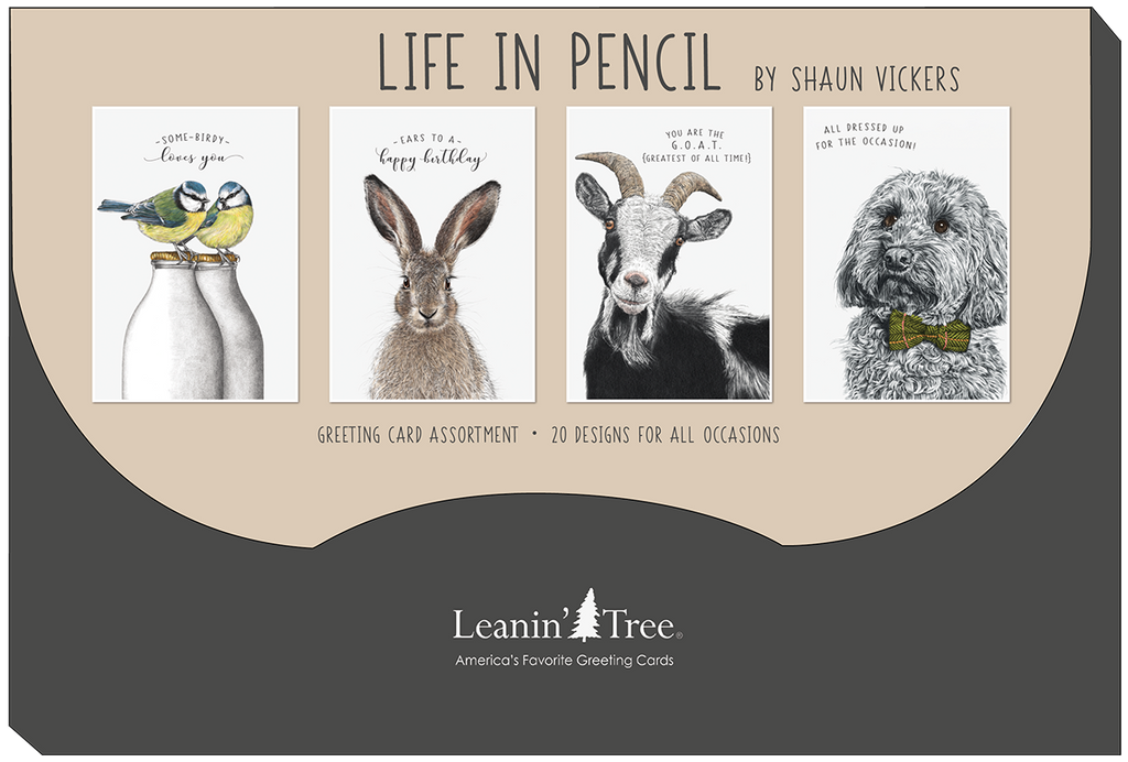 Leanin' Tree 'Life in Pencil by Shaun Vickers' greeting card assortment branding, featuring four animal illustrations: bluebirds, a rabbit, a goat, and a dog, highlighting 20 designs for all occasions.
