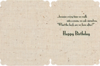 Inside view of a funny senior card revealing the punchline 'What the heck are we here after? Happy Birthday' on a rustic fabric background, perfect for a grandparent's celebration.