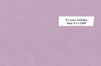 Inside of a humorous greeting card with a simple message on a white rectangular strip: 'It's your birthday - hope it's a GAS!' on a light purple background.