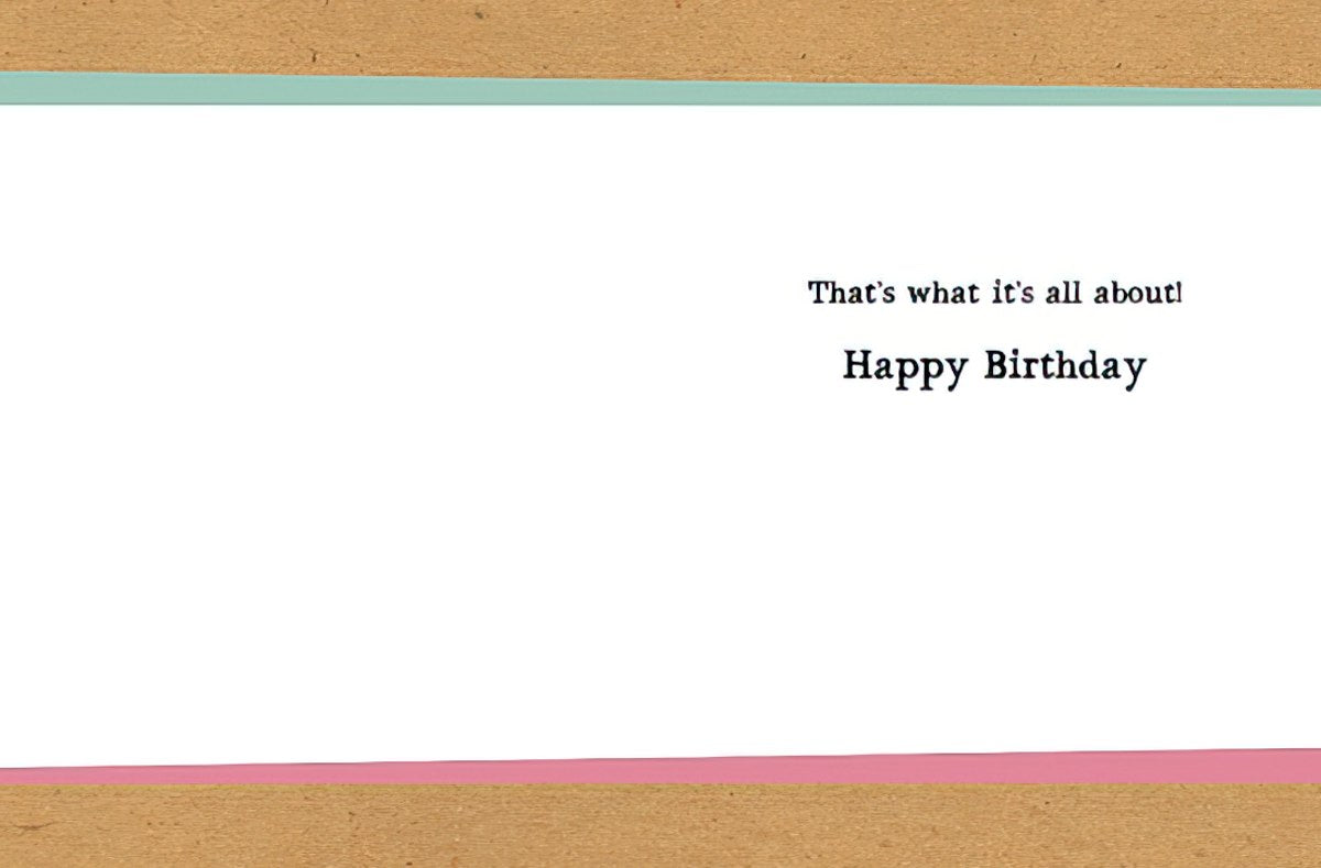 Inside of a humorous birthday greeting card displaying the message 'That's what it's all about! Happy Birthday' in black text.