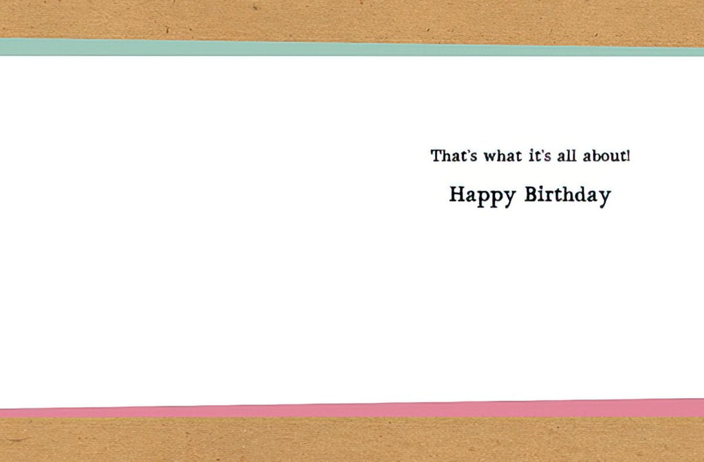 Inside view of a humorous greeting card revealing the simple message 'That's what it's all about! Happy Birthday' in black font.