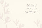 Inside of a thoughtful greeting card with a delicate floral design and a warm message: 'May this find you with a smile on your face and laughter in your heart. Happy Birthday, My Friend.' Ideal for celebrating a cherished female friend.