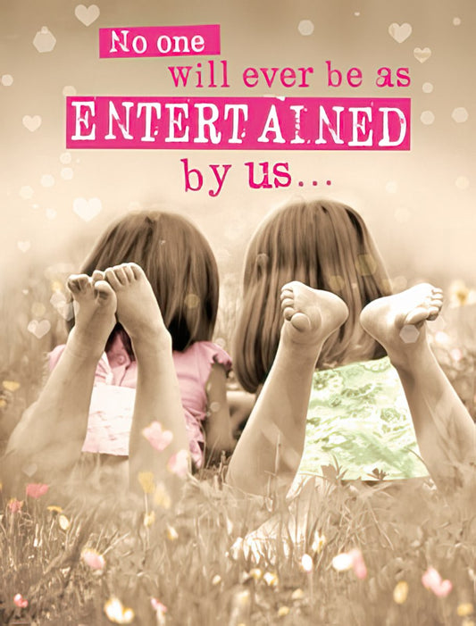 Two young girls lying in a field of flowers, seen from behind, with text 'No one will ever be as ENTERTAINED by us...'