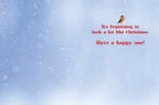 Inside of a snowy holiday greeting card featuring a small robin and heartwarming text: 'It's beginning to look a lot like Christmas. Have a happy one!'