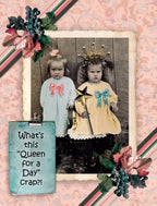Vintage-style greeting card front featuring two sassy young girls, one wearing a crown and holding a star wand, with humorous text 'What's this Queen for a Day Crap?!' surrounded by floral embellishments, perfect for a child or friend.