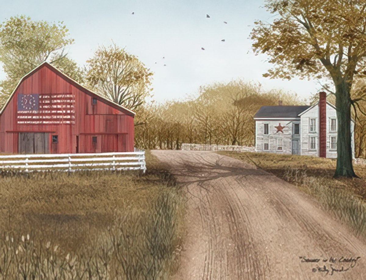 Close-up of a Billy Jacobs Country Charm Christmas note card showing a red barn with an American flag design, a white house, and a dirt road.