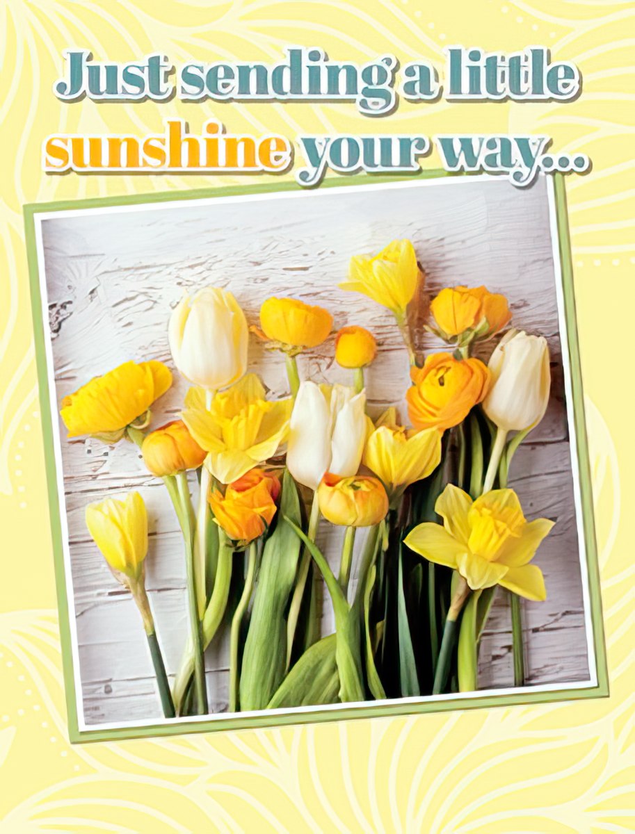 Bright yellow and white floral greeting card front with 'Just sending a little sunshine your way...' text, featuring a vibrant bouquet of tulips, daffodils, and ranunculus, perfect for encouraging a friend.