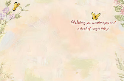 Inside of 'Happy Birthday' card with butterflies and text: 'Wishing you sunshine, joy and a touch of magic today!'.
