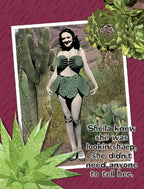 Front of a sassy birthday card featuring a vintage-style woman in a green leaf-patterned bikini with a shell bra, posing confidently in a desert landscape with saguaro cacti and succulents. The text reads: "Sheila knew she was lookin' sharp, she didn't need anyone to tell her." The card has a deep red background with green succulent accents.