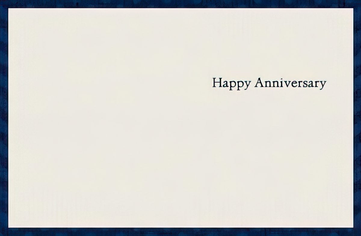 Inside of a simple, elegant anniversary card with the message 'Happy Anniversary' centered on a white background, framed by a dark blue border.