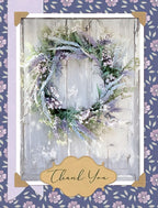 Greeting card featuring a beautiful lavender wreath on a rustic white wooden door, framed by a purple floral pattern, with 'Thank You' in elegant script.