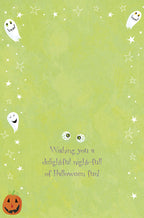 Inside of a light green spooky season greeting card showing more ghosts, stars, and a sweet message 'Wishing you a delightful night-full of spooky fun!', perfect for sending cute sentiments.