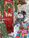 Cheerful snowman delivers gifts outside a festive red door with a holiday wreath in a snowy winter scene, perfect for season's greetings cards.