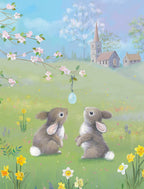 Two adorable baby bunnies gaze up at a delicate blue decorated egg hanging from a cherry blossom branch in a vibrant spring meadow with daffodils, a distant church, and a blue sky, perfect for a joyful religious holiday message.