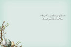 Inside of a serene blue Easter blessing card featuring a heartfelt message 'May the many blessings of Easter decorate your heart and home' and a subtle watercolor pussy willow and egg design.