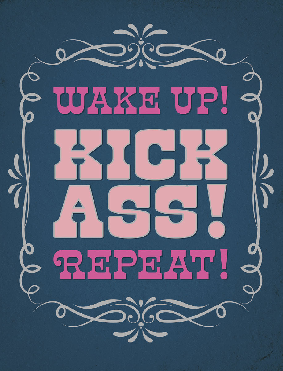 Front of a sassy birthday greeting card with a dark blue background and an ornate white frame. Bold pink text reads: WAKE UP! KICK ASS! REPEAT! for motivation.