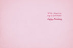 Inside of a pink birthday card featuring a dark pink message 'With a heart as big as the West! Happy Birthday', perfect for a female friend.