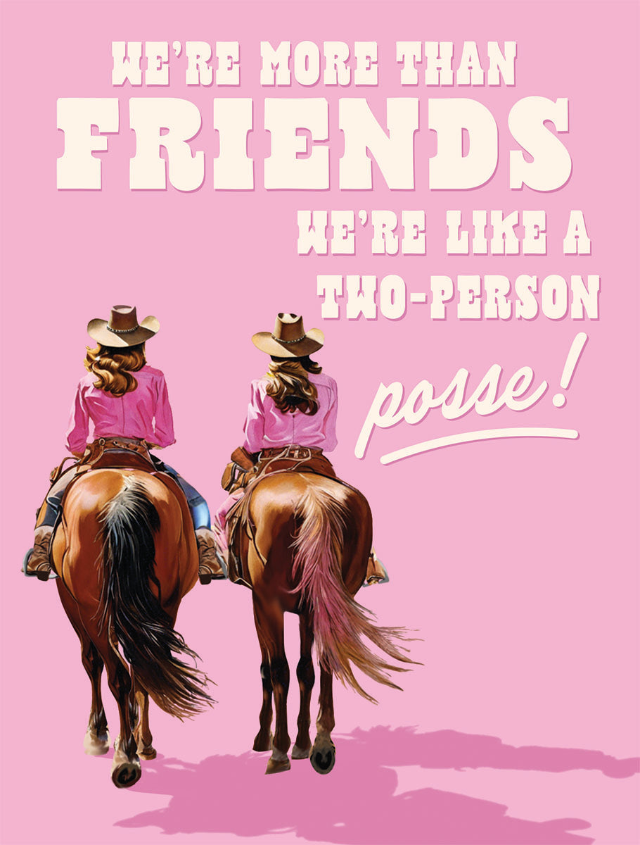 Greeting card featuring two cowgirls riding horses, viewed from behind, on a vibrant pink background. White text declares 'WE'RE MORE THAN FRIENDS WE'RE LIKE A TWO-PERSON POSSE!'. Perfect for a best pal or riding partner.