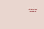 Inside of a light pink greeting card, featuring the playful, sassy message 'Now go kick some marriage ass!' in a dark red script font.