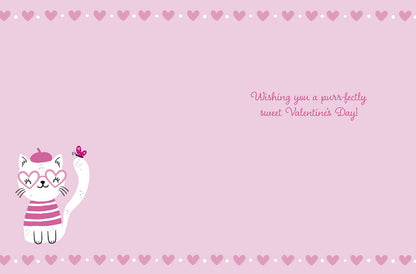 Inside of a pink greeting card with a cute cat illustration and the message: 'Wishing you a purr-fectly sweet Valentine's Day!'