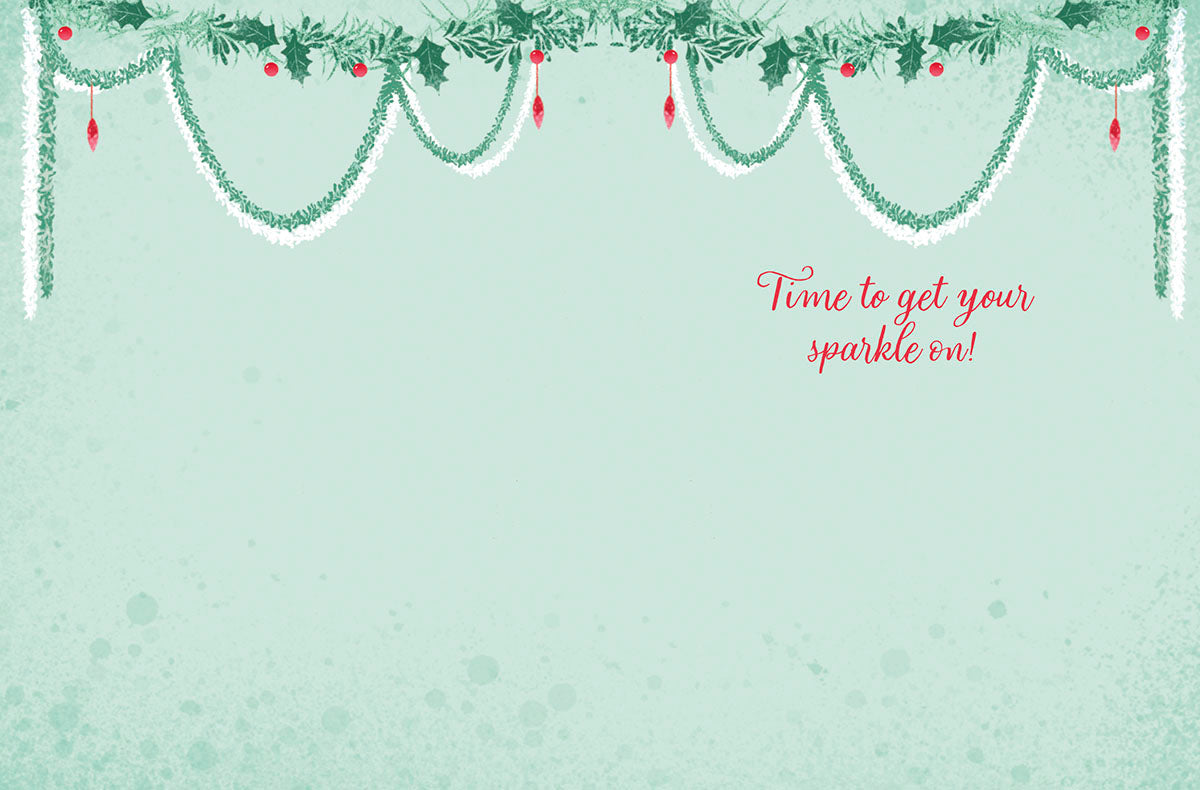 Inside of a holiday greeting card with a minimalist blue-green background, decorative winter garland border, and the playful message 'Time to get your sparkle on!' in red script.