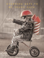 Funny greeting card for him, featuring a retro sepia photo of a child in a pilot helmet with a rocket backpack on a tricycle, pointing forward. The card reads 'EVERYONE GETS TO BE YOUNG ONCE...' perfect for a friend's milestone celebration.