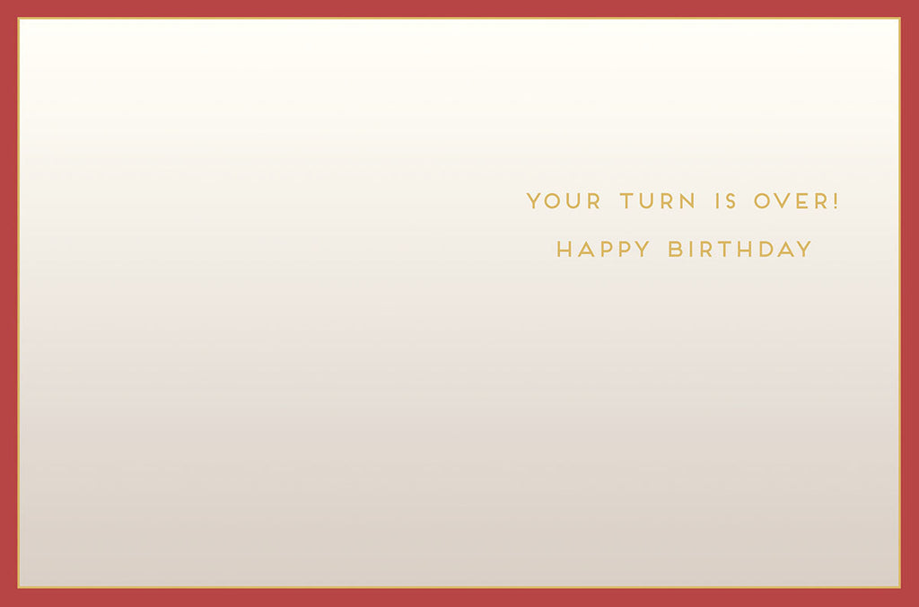 Inside a humorous birthday card for adults, displaying a cream background with a red border and the bold text 'YOUR TURN IS OVER! HAPPY BIRTHDAY', celebrating age with a playful jest for a friend.