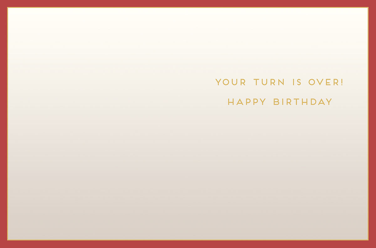 Inside a humorous birthday card for adults, displaying a cream background with a red border and the bold text 'YOUR TURN IS OVER! HAPPY BIRTHDAY', celebrating age with a playful jest for a friend.