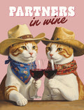 Funny greeting card featuring two ginger and white cats wearing cowboy hats and blue and red bandanas, clinking wine glasses, with the text 'PARTNERS in wine' on a pink background. Perfect for wine lovers and best pals.
