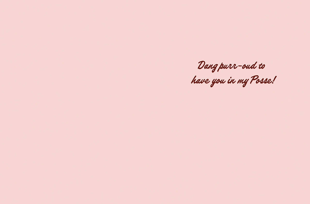 Inside of a humorous friendship card, showing a blank pink background with cursive text 'Dang purr-oud to have you in my Posse!'.