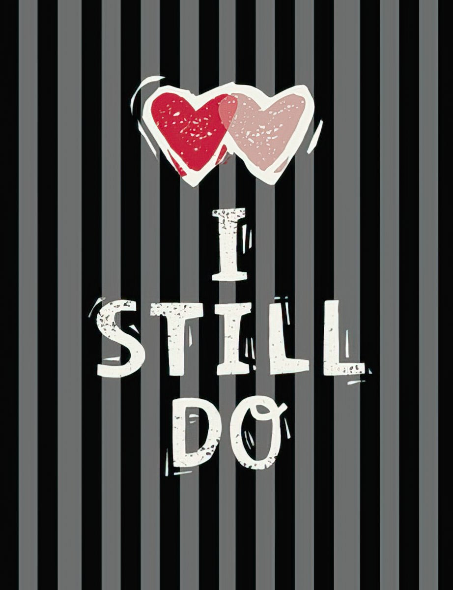 Front of a romantic greeting card with black and grey vertical stripes, featuring two distressed pink hearts above the white text 'I STILL DO'.