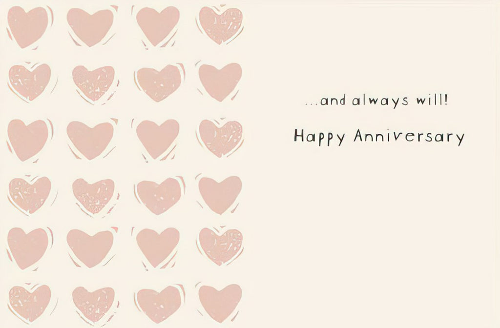 Inside of a romantic greeting card with a light cream background, featuring a pattern of multiple small pink hearts and the text '...and always will! Happy Anniversary'.