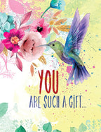 Front of a vibrant floral greeting card featuring a hummingbird amidst pink, teal, and yellow flowers with the heartfelt message 'YOU ARE SUCH A GIFT...' perfect for celebrating her special day.