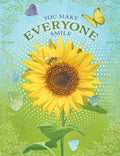 Vibrant sunflower greeting card front with a bee, butterflies, and text 'YOU MAKE EVERYONE SMILE' on a green and blue patterned background. Ideal for a complimentary friend's card.