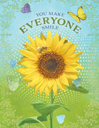 Vibrant sunflower greeting card front with a bee, butterflies, and text 'YOU MAKE EVERYONE SMILE' on a green and blue patterned background. Ideal for a complimentary friend's card.