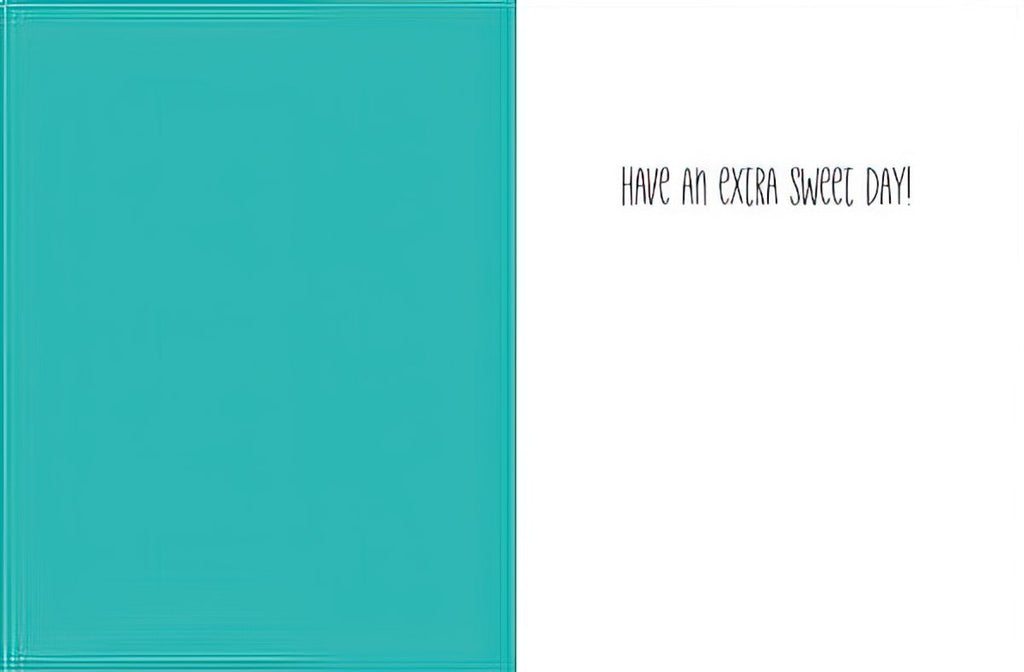 Inside of a greeting card with a solid teal panel on the left and a white panel on the right, featuring the handwritten-style text 'HAVE AN EXTRA SWEET DAY!' on the right. Blank space for personal messages.