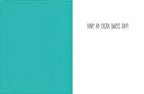 Inside of a greeting card with a solid teal panel on the left and a white panel on the right, featuring the handwritten-style text 'HAVE AN EXTRA SWEET DAY!' on the right. Blank space for personal messages.