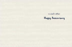 Inside of an anniversary greeting card featuring a subtle patterned background and the heartfelt message: 'is each other. Happy Anniversary' in elegant script.